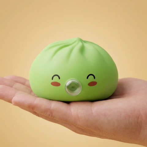 Dumpling Squishy Matcha Rare Blow Zielony w dłoni — porównanie rozmiaru