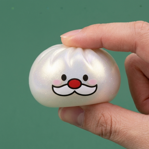 Squishy Dumpling Mystery Wąsy Mikołaja ściskany w dłoni